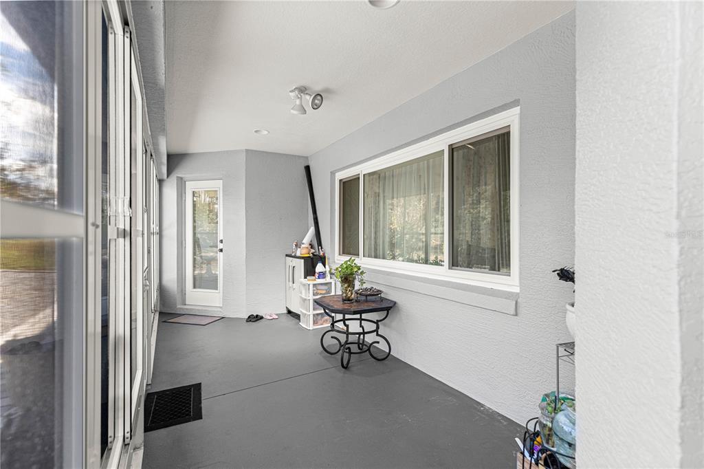 8601 Southwest 60th Circle Ocala, FL 34476 - Photo 28 of 45 a living room with furniture and a window