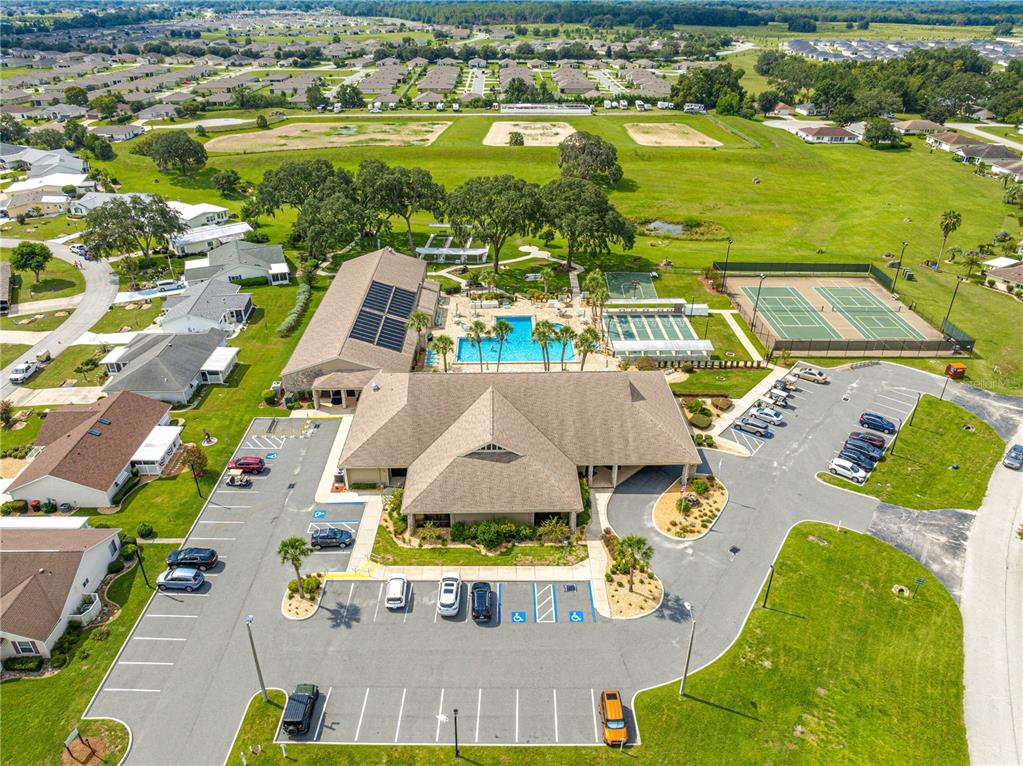 8601 Southwest 60th Circle Ocala, FL 34476 - Photo 31 of 37 an aerial view of residential houses with outdoor space and swimming pool