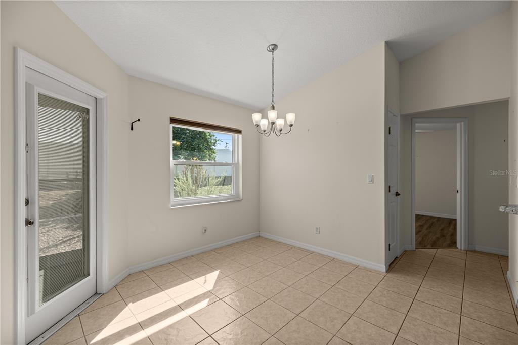 8601 Southwest 60th Circle Ocala, FL 34476 - Photo 5 of 37 a view of livingroom with window