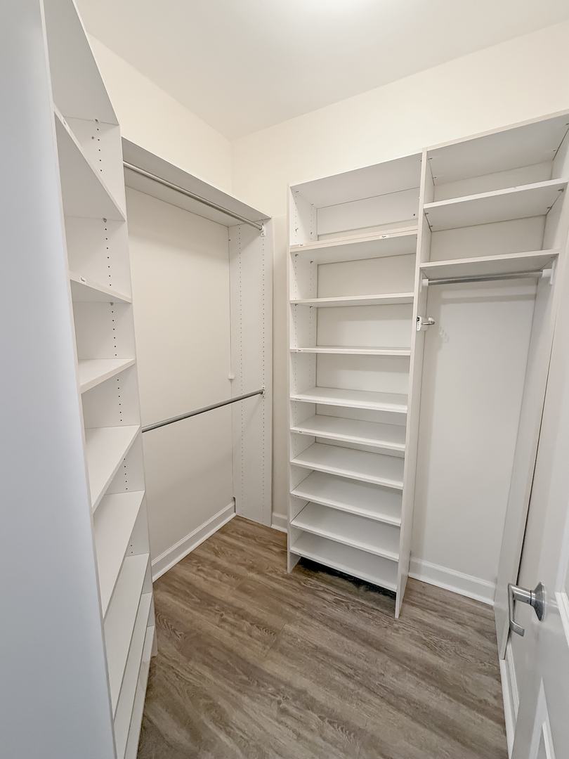 720 West Randolph Street, Unit 608 Chicago, IL 60661 - Photo 23 of 40 a view of walk in closet with empty racks