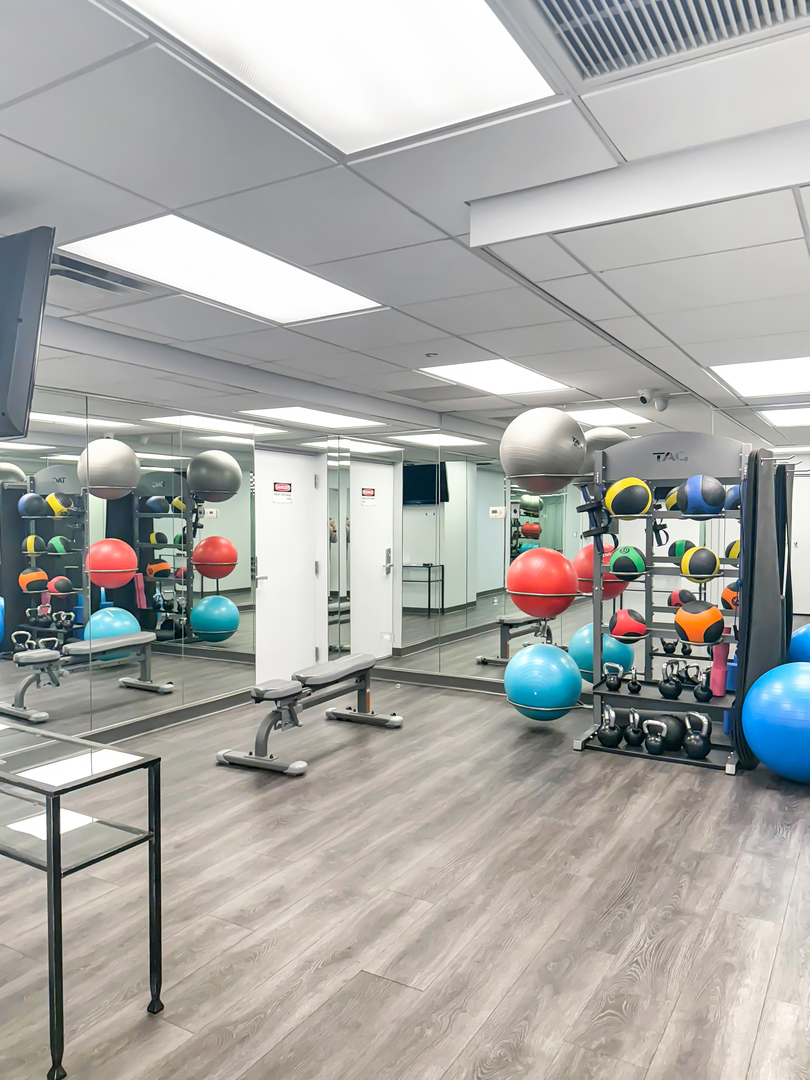 720 West Randolph Street, Unit 608 Chicago, IL 60661 - Photo 34 of 40 a view of a room with gym equipment