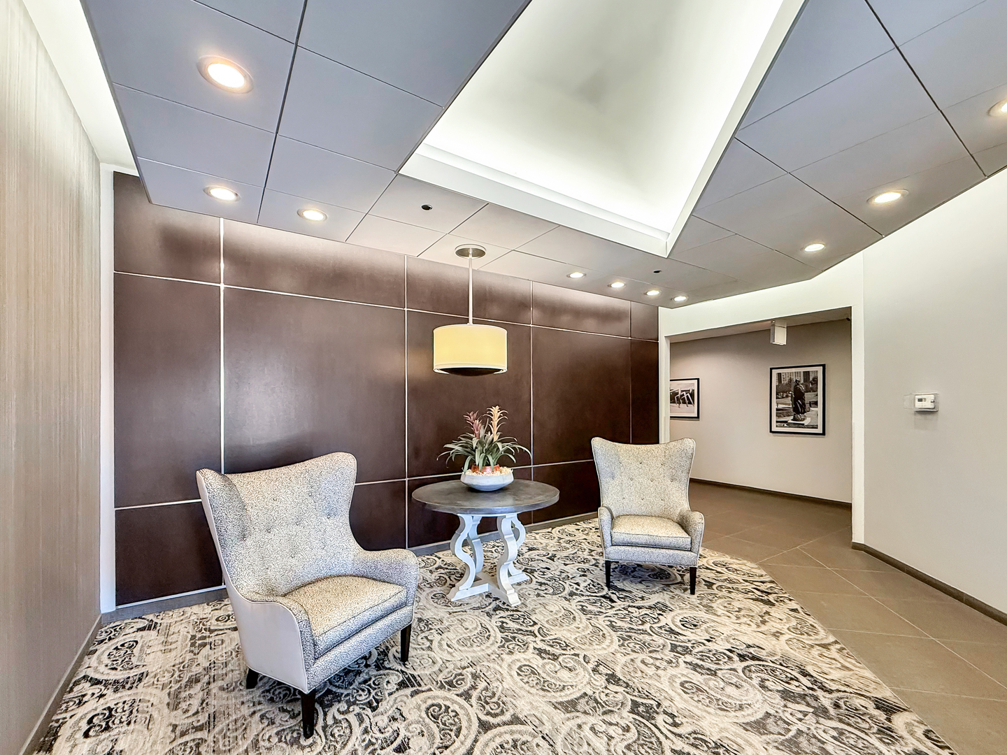 720 West Randolph Street, Unit 608 Chicago, IL 60661 - Photo 37 of 40 a living room with furniture and wooden floor