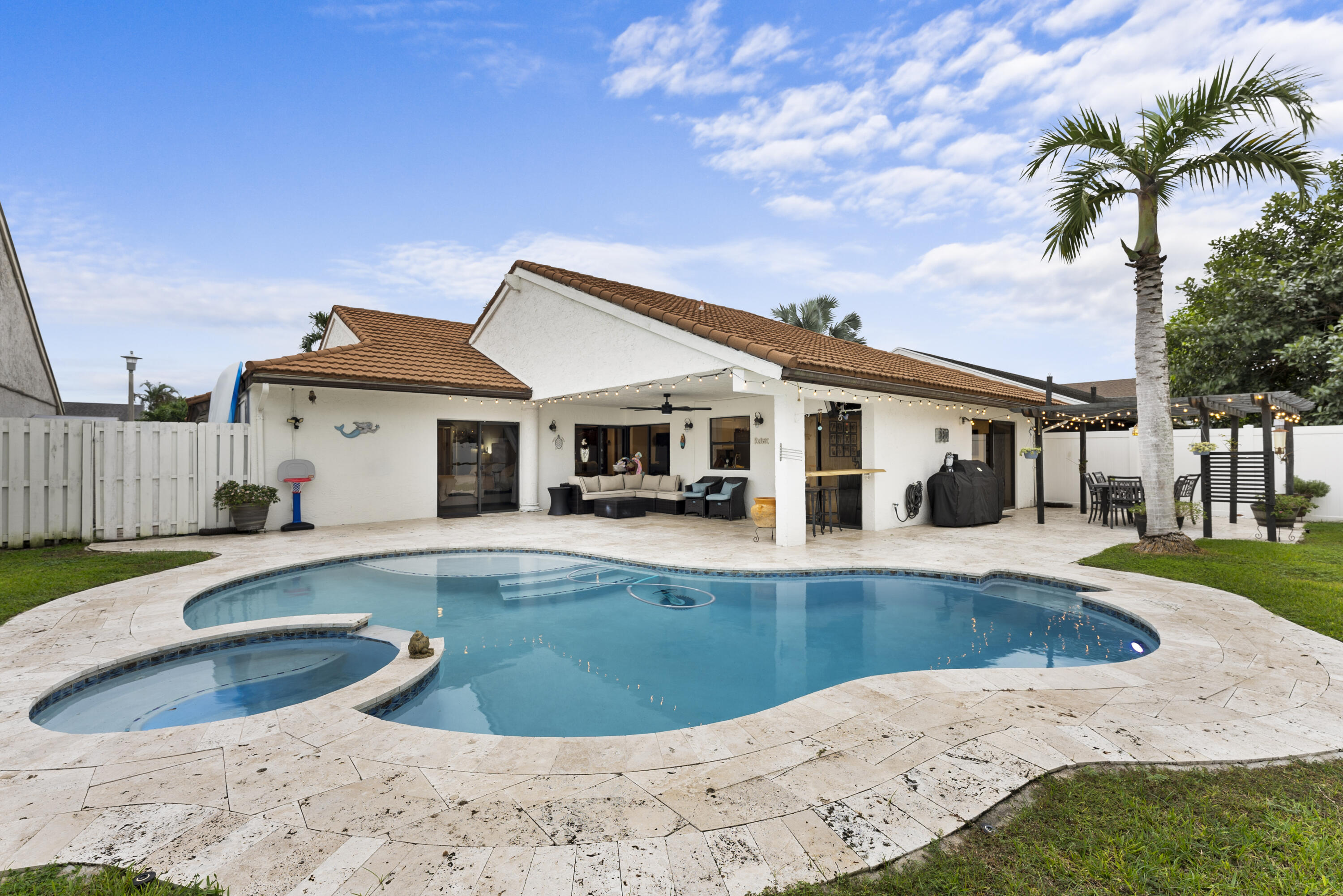 11627 Countryview Lane Boca Raton, FL 33428 - Photo 3 of 44 a view of a house with swimming pool and sitting area