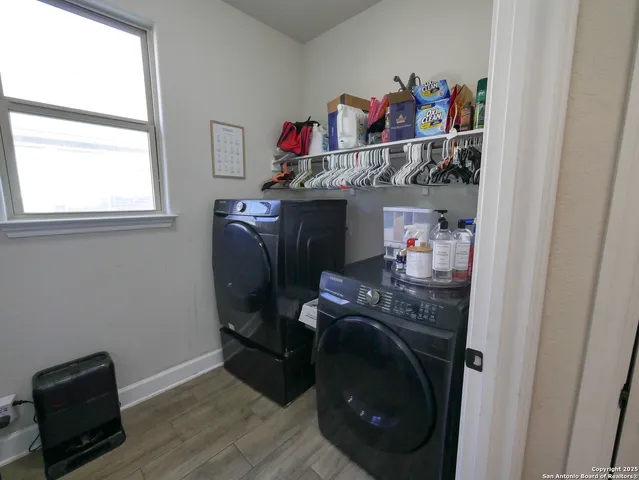 a view of a house with backyard porch and sitting area