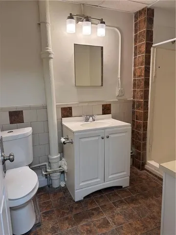 a view of hallway with wooden floor