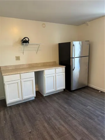 a view of small space with wooden floor