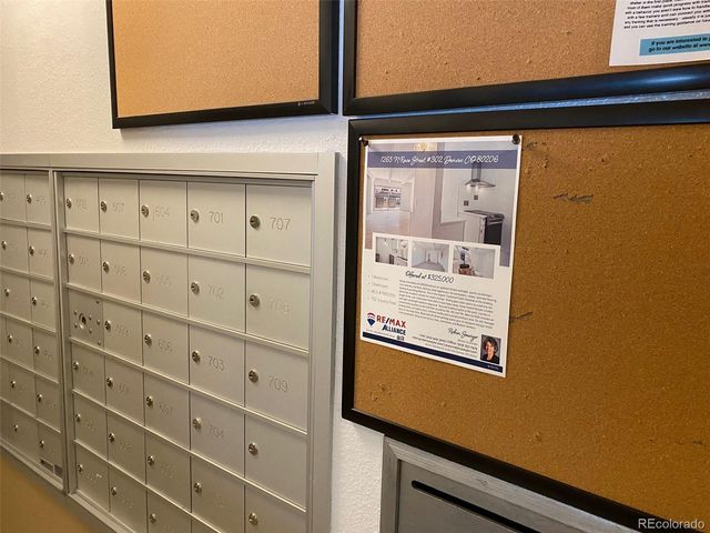 a bathroom with a shower and a sink