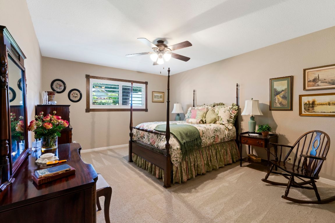 2911 Gabriel View Drive Georgetown, TX 78628 - Photo 15 of 39 a bedroom with bed and a window