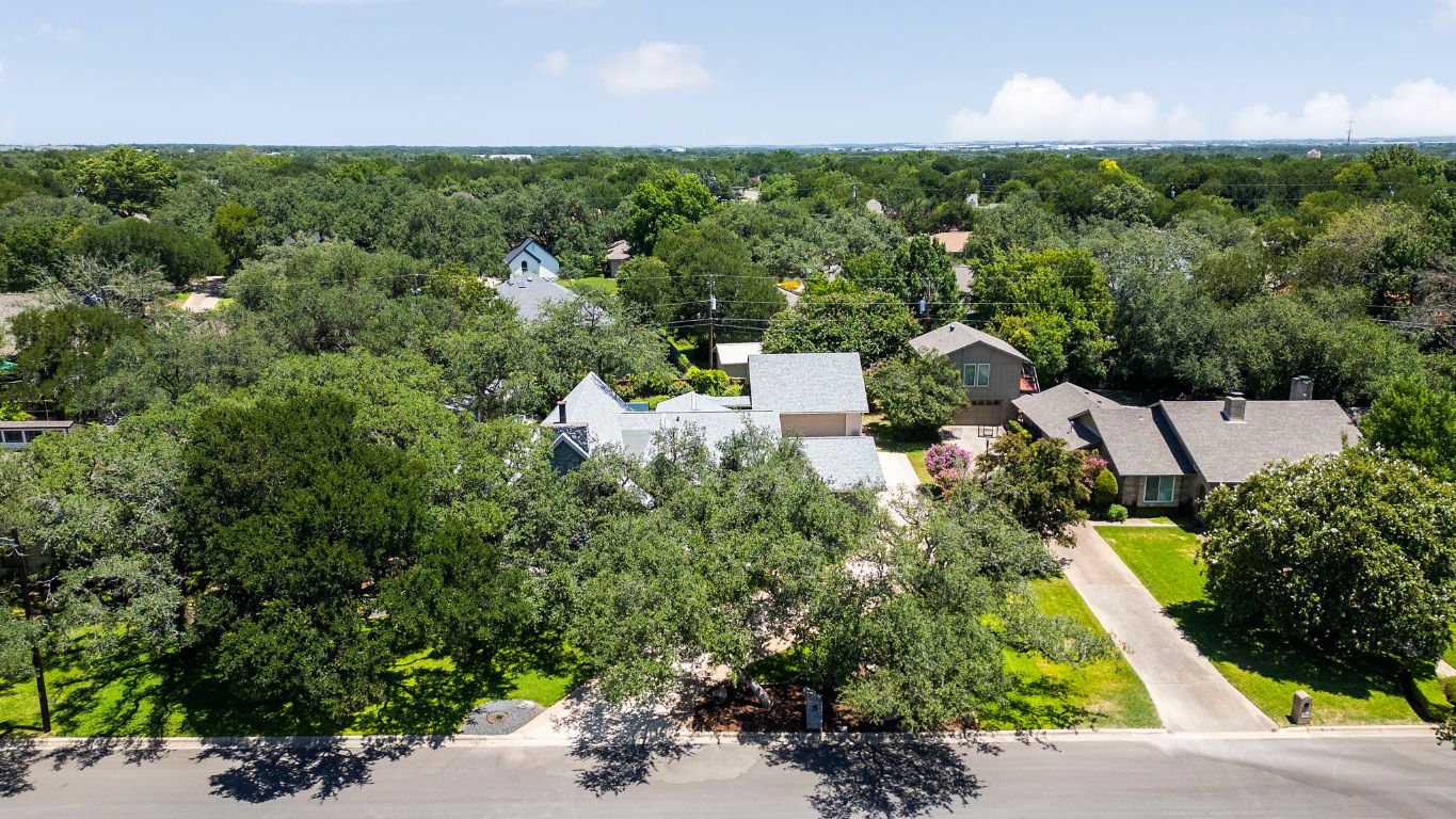 2911 Gabriel View Drive Georgetown, TX 78628 - Photo 34 of 39 an aerial view of a house with lots of trees