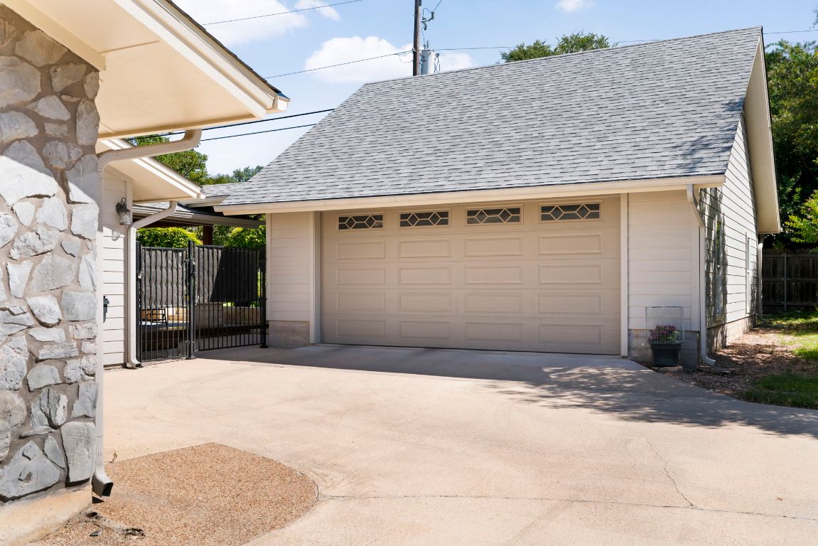 2911 Gabriel View Drive Georgetown, TX 78628 - Photo 38 of 39 a front view of a house with a garage
