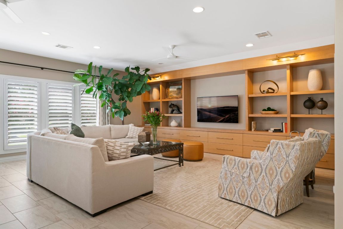 2911 Gabriel View Drive Georgetown, TX 78628 - Photo 4 of 39 a living room with furniture and a flat screen tv