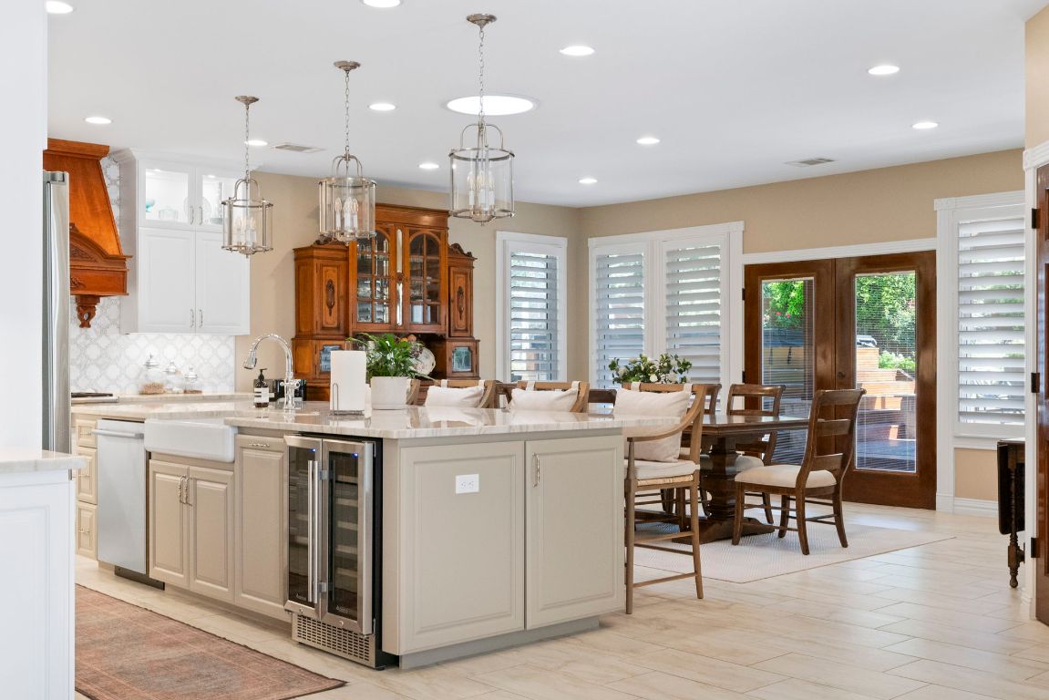 2911 Gabriel View Drive Georgetown, TX 78628 - Photo 6 of 39 a view of a kitchen and dining table chairs