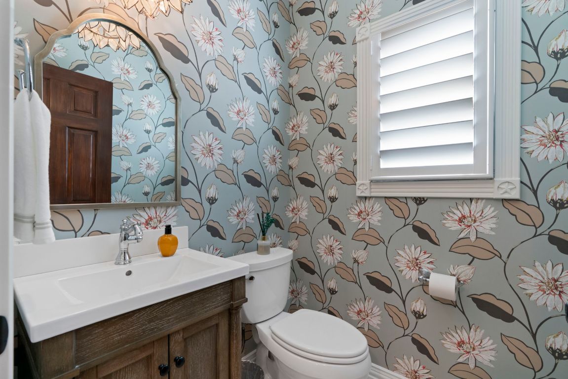 2911 Gabriel View Drive Georgetown, TX 78628 - Photo 10 of 39 a bathroom with a sink a toilet and a mirror