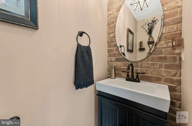 a view of an entryway door and hallway