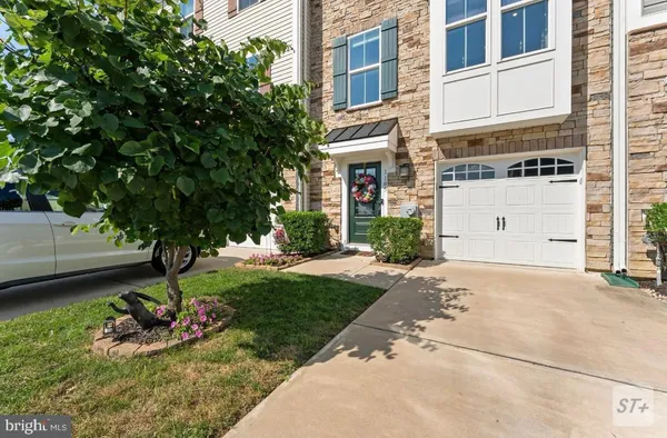 a house view with a garden space