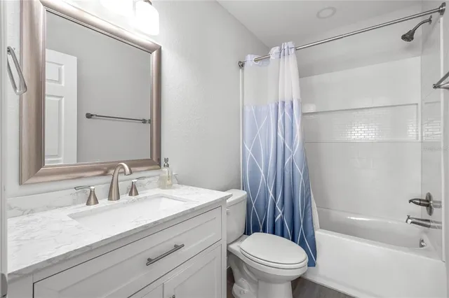 a view of storage and utility room with washer and dryer