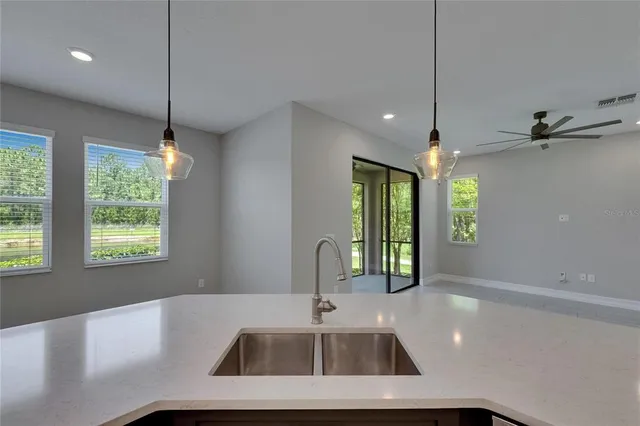 a bathroom with a double vanity sink and mirror