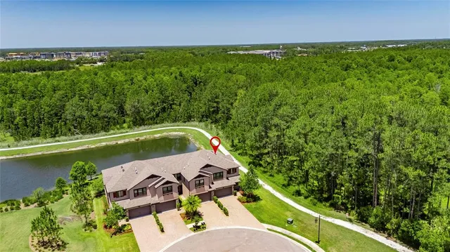 a view of a house with a yard and plants