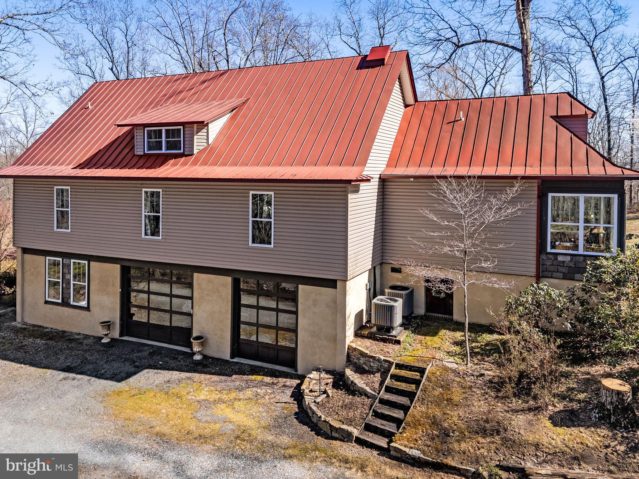 40 Angel Kiss Lane Castleton, VA 22716 - Photo 37 of 56 Rear of home showing 2-zone heating units, garages