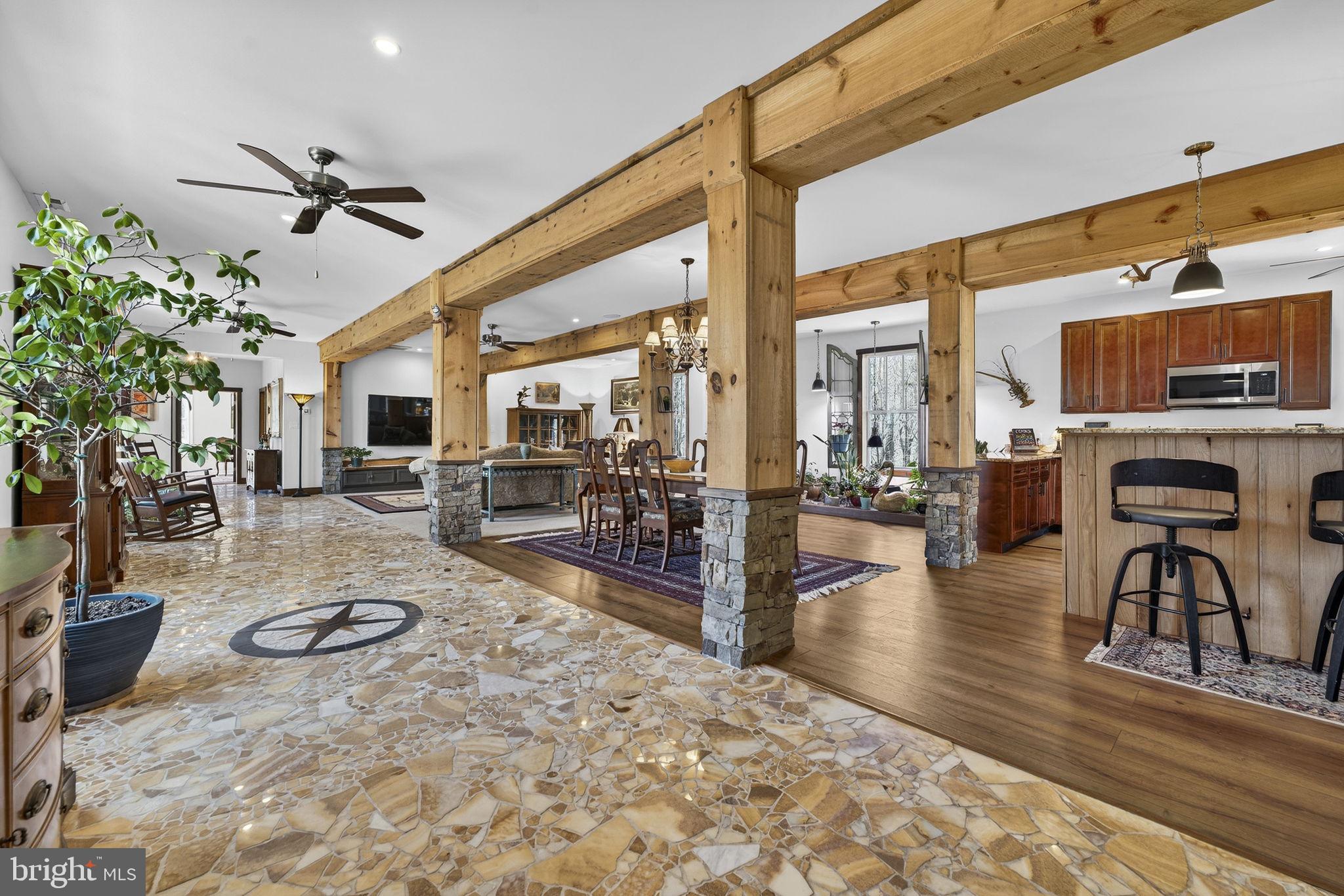 40 Angel Kiss Lane Castleton, VA 22716 - Photo 6 of 56 Cedar wrapped beams & stacked stone bases