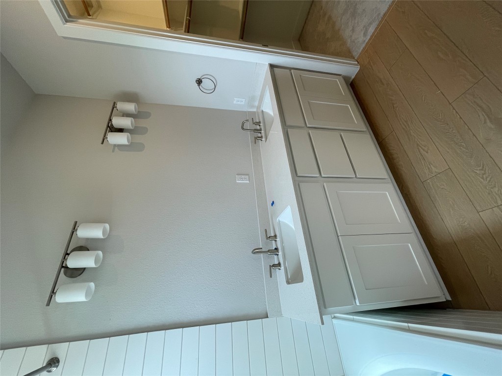 4701 Wally Avenue, Unit A Austin, TX 78721 - Photo 17 of 35 a utility room with sink dryer and washer