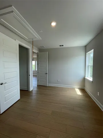 a view of an empty room and window