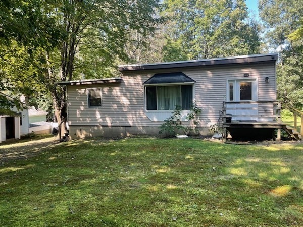 5 Island Road Lunenburg, MA 01462 - Photo 1 of 19 a front view of a house with garden