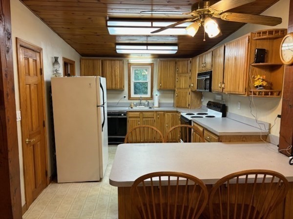 5 Island Road Lunenburg, MA 01462 - Photo 7 of 19 a view of a kitchen with a sink storage and utility