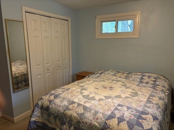 5 Island Road Lunenburg, MA 01462 - Photo 9 of 19 a bedroom with a bed and a window
