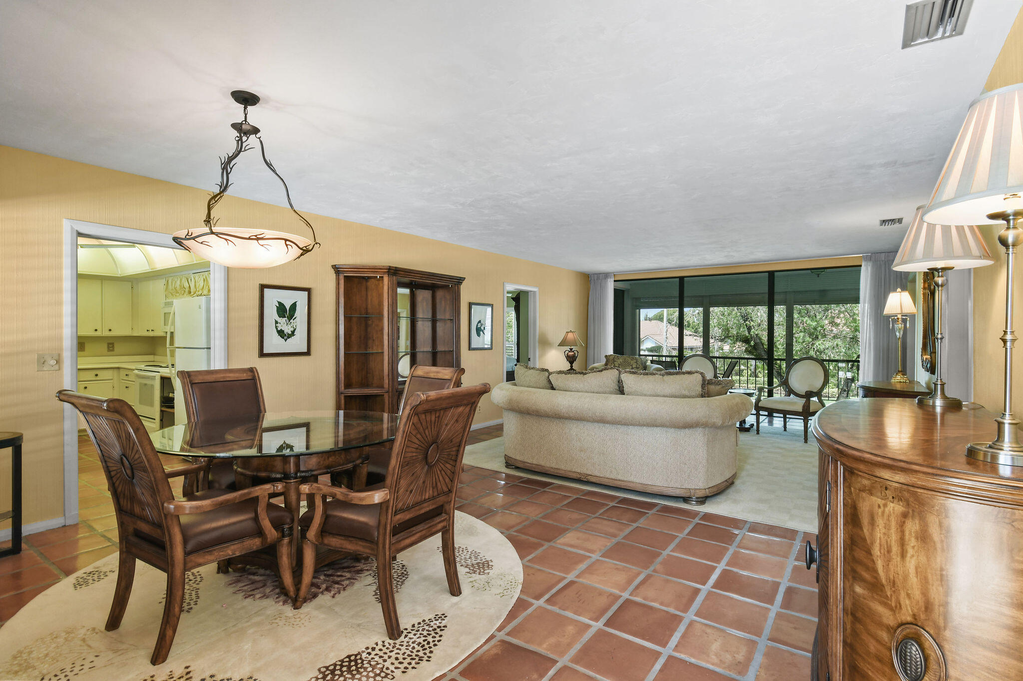 3 Southeast Turtle Creek Drive, Unit E Tequesta, FL 33469 - Photo 13 of 51 a dining room with furniture and window