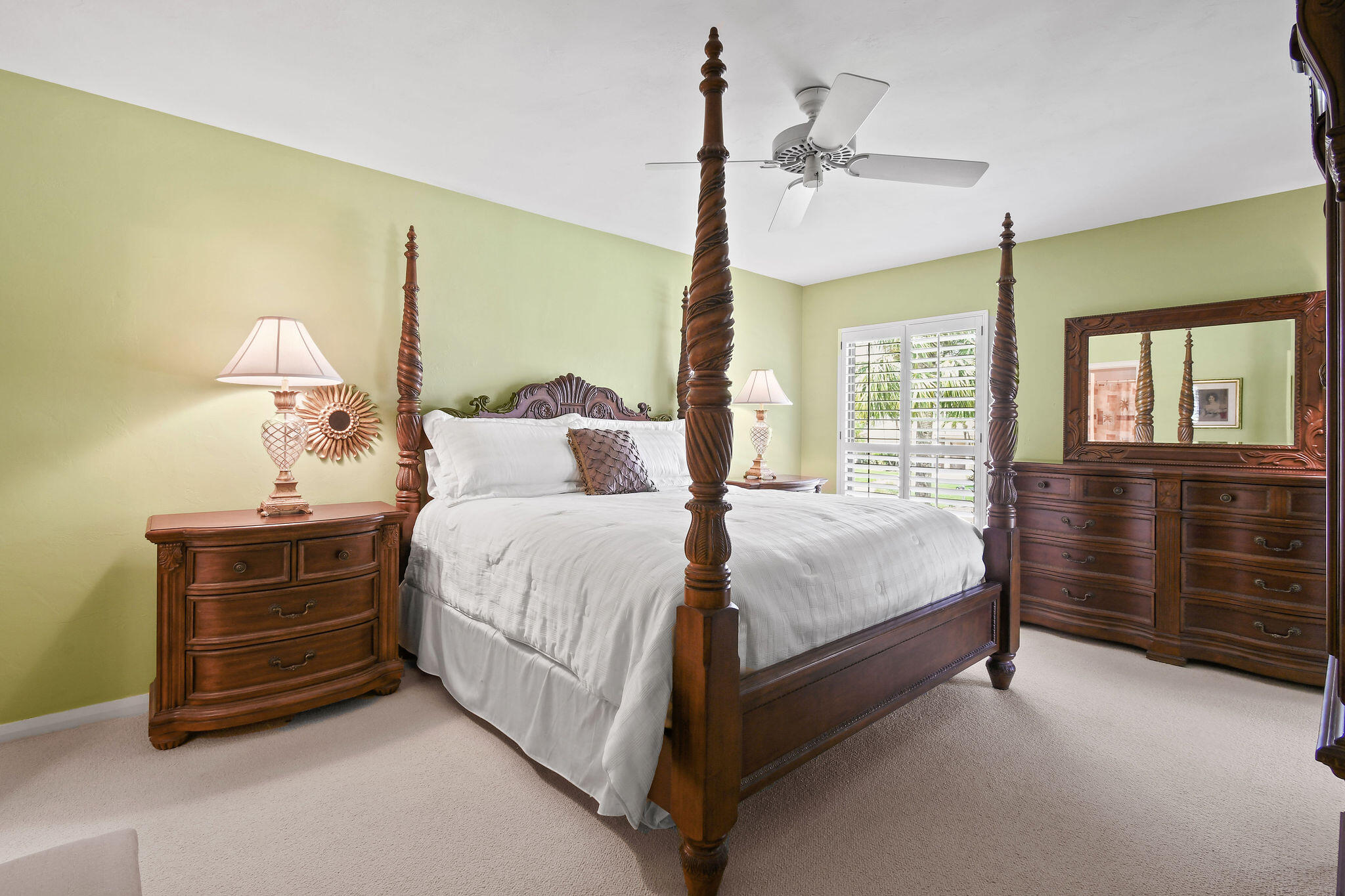 3 Southeast Turtle Creek Drive, Unit E Tequesta, FL 33469 - Photo 18 of 51 a bedroom with a bed dresser and a window