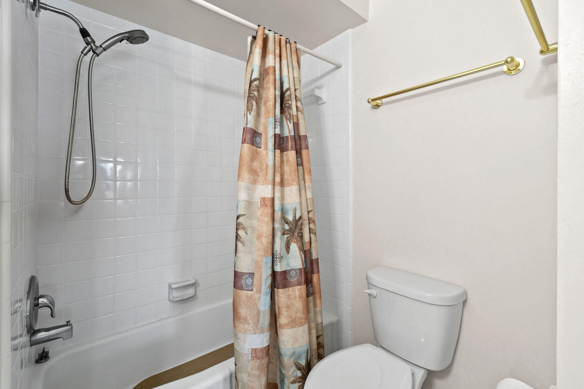 3 Southeast Turtle Creek Drive, Unit E Tequesta, FL 33469 - Photo 20 of 51 a bathroom with a shower toilet and sink