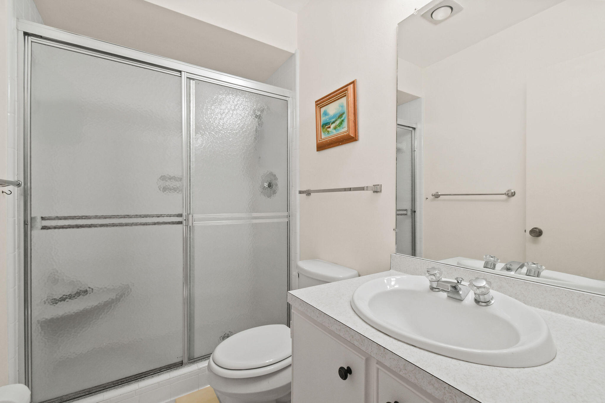 3 Southeast Turtle Creek Drive, Unit E Tequesta, FL 33469 - Photo 23 of 51 a bathroom with a sink toilet and shower