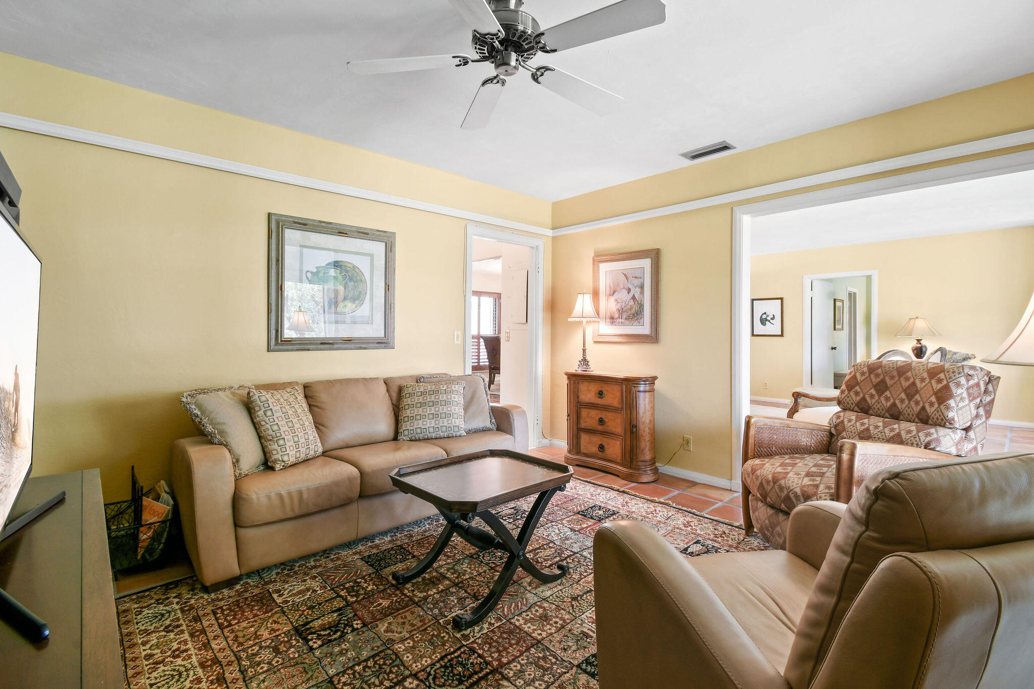 3 Southeast Turtle Creek Drive, Unit E Tequesta, FL 33469 - Photo 26 of 51 a living room with furniture and a rug