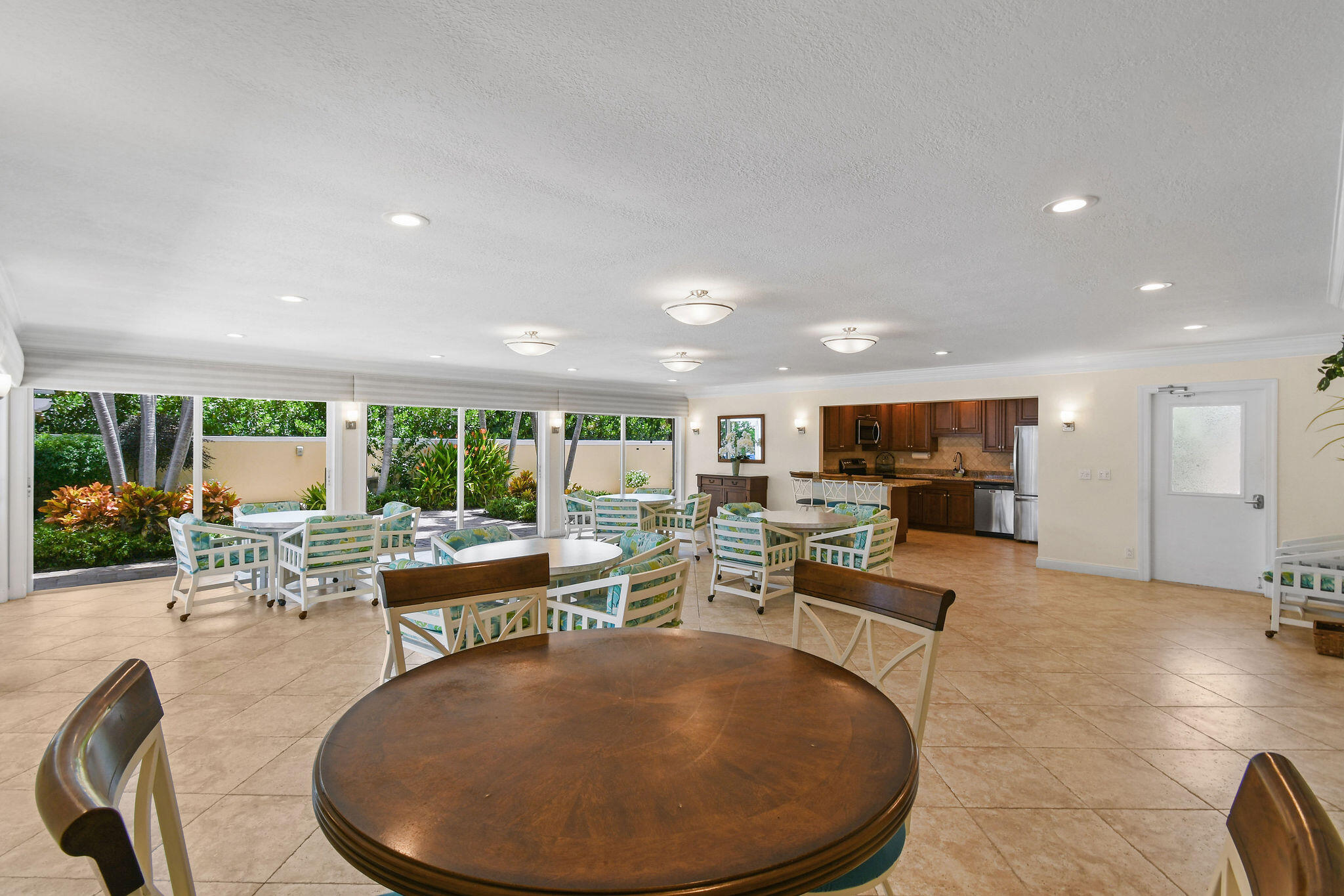3 Southeast Turtle Creek Drive, Unit E Tequesta, FL 33469 - Photo 31 of 51 a living room with fireplace furniture and a large window