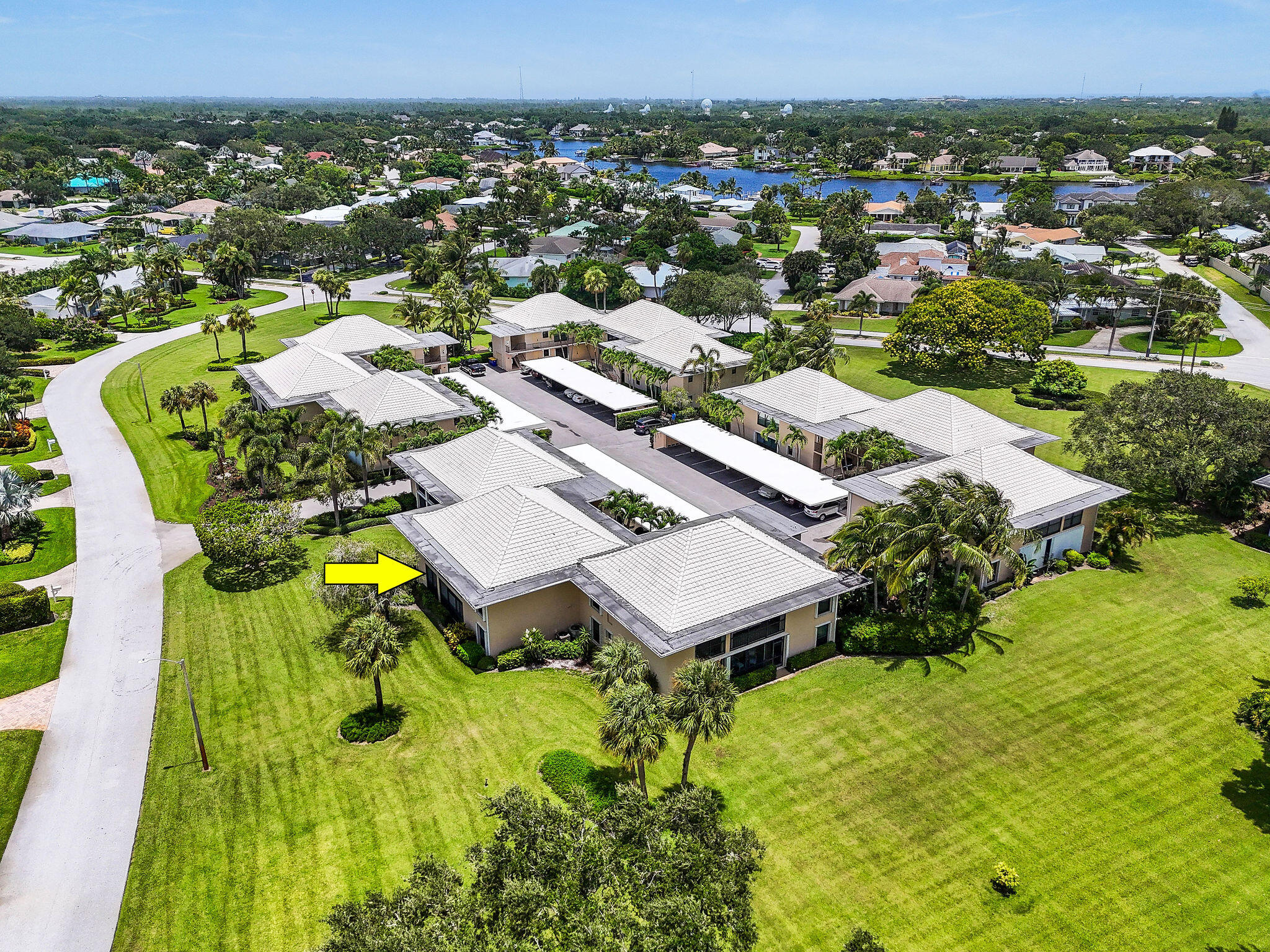 3 Southeast Turtle Creek Drive, Unit E Tequesta, FL 33469 - Photo 40 of 51 an aerial view of residential houses with outdoor space