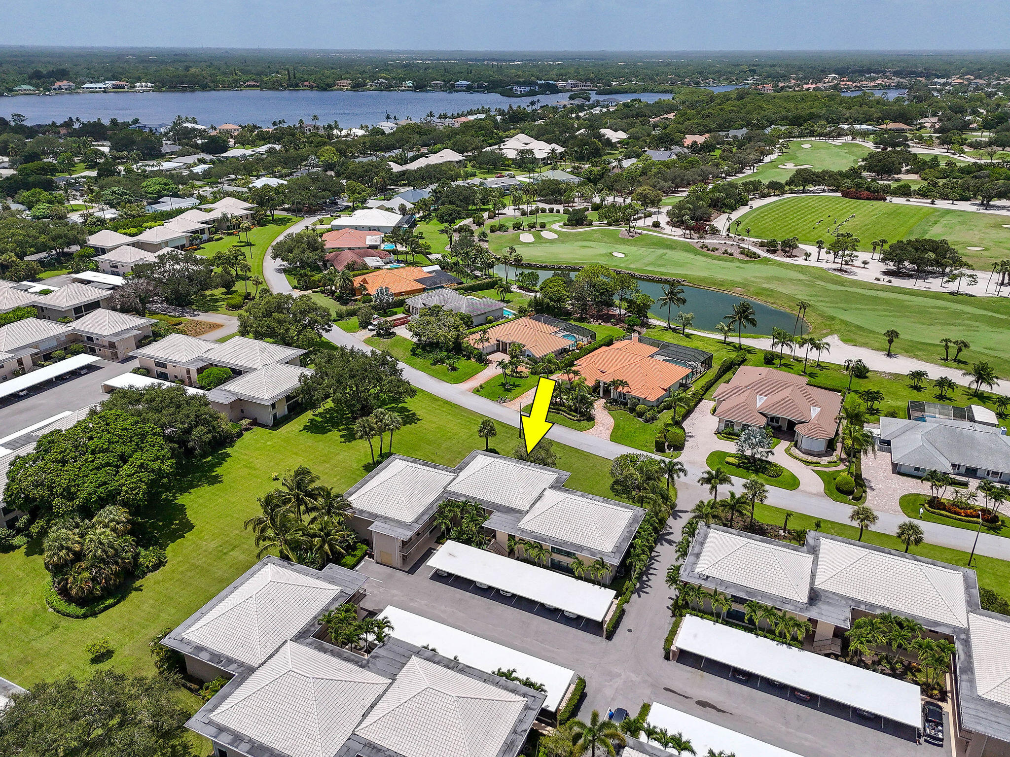 3 Southeast Turtle Creek Drive, Unit E Tequesta, FL 33469 - Photo 43 of 51 an aerial view of residential houses with outdoor space