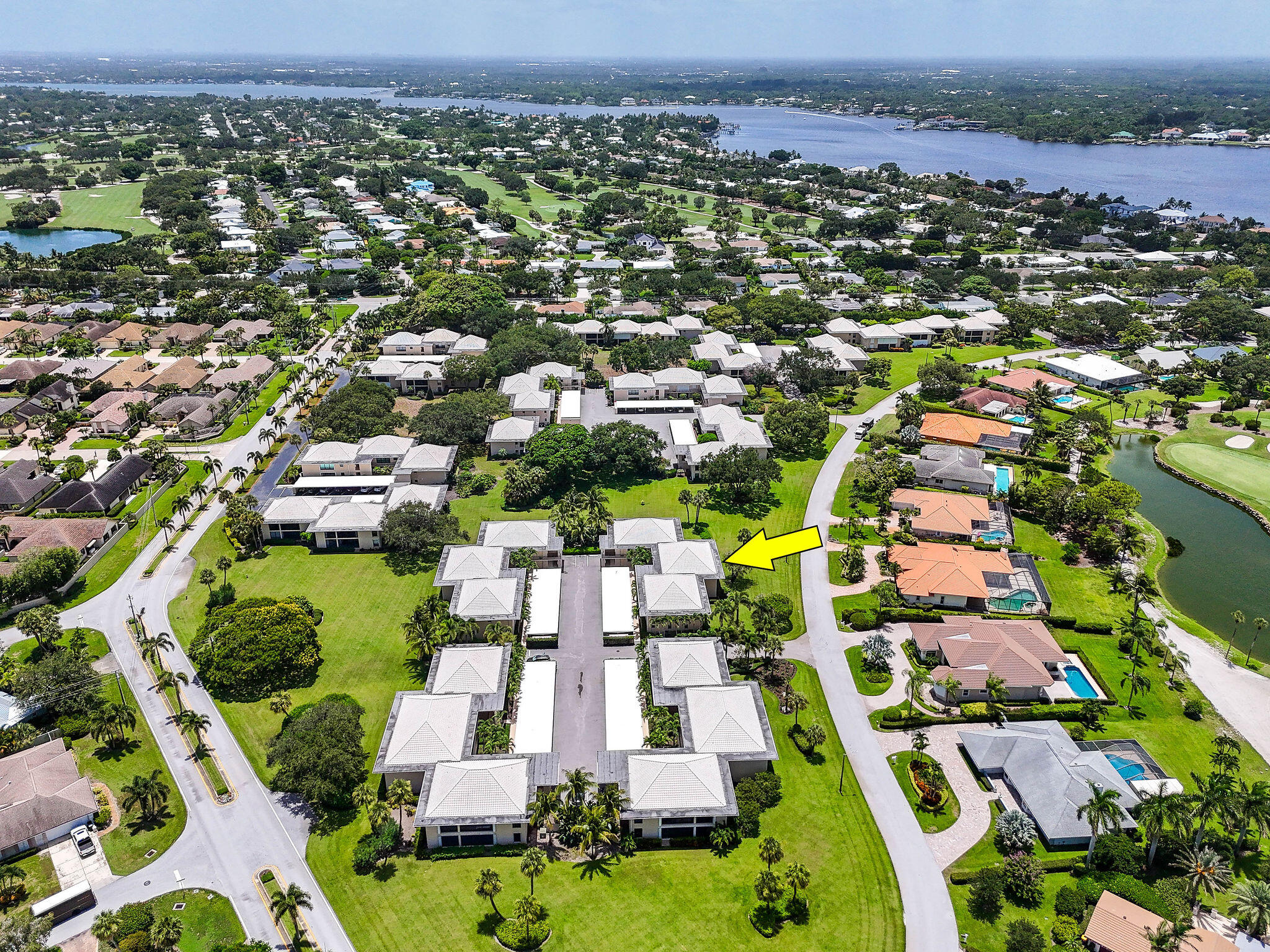 3 Southeast Turtle Creek Drive, Unit E Tequesta, FL 33469 - Photo 45 of 51 an aerial view of residential houses with outdoor space