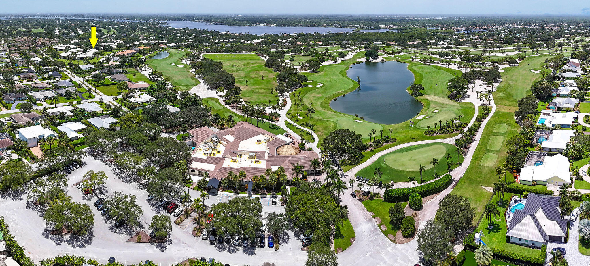 3 Southeast Turtle Creek Drive, Unit E Tequesta, FL 33469 - Photo 47 of 51 an aerial view of residential houses with outdoor space and trees