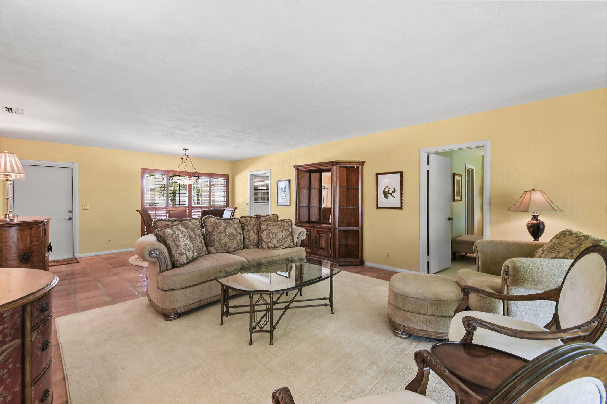 3 Southeast Turtle Creek Drive, Unit E Tequesta, FL 33469 - Photo 8 of 51 a living room with furniture and a couch