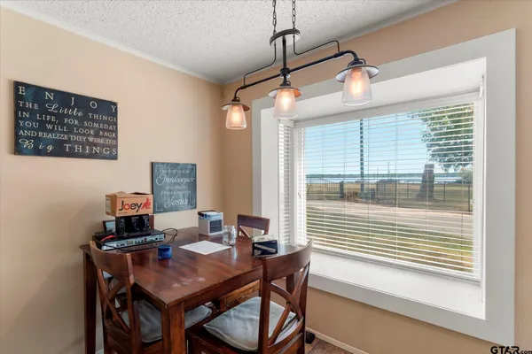 a workspace with furniture and window