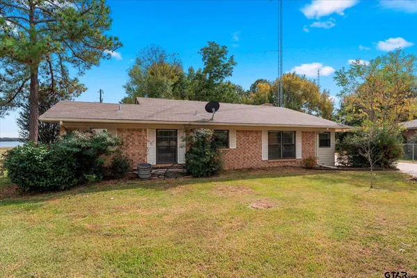 a front view of a house with swimming pool