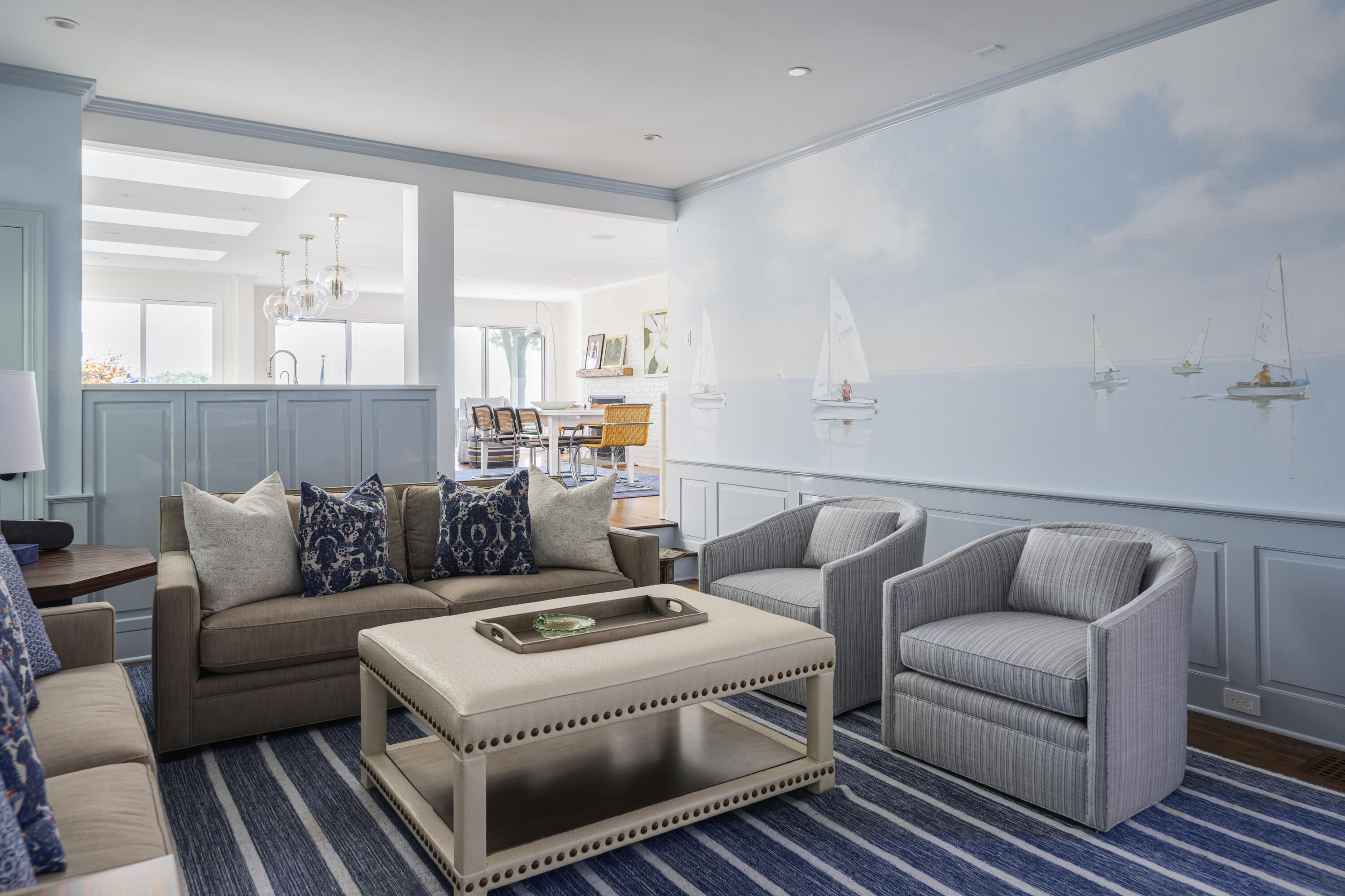 123 Long Neck Point Road Darien, CT 06820 - Photo 18 of 40 a living room with furniture and a large window