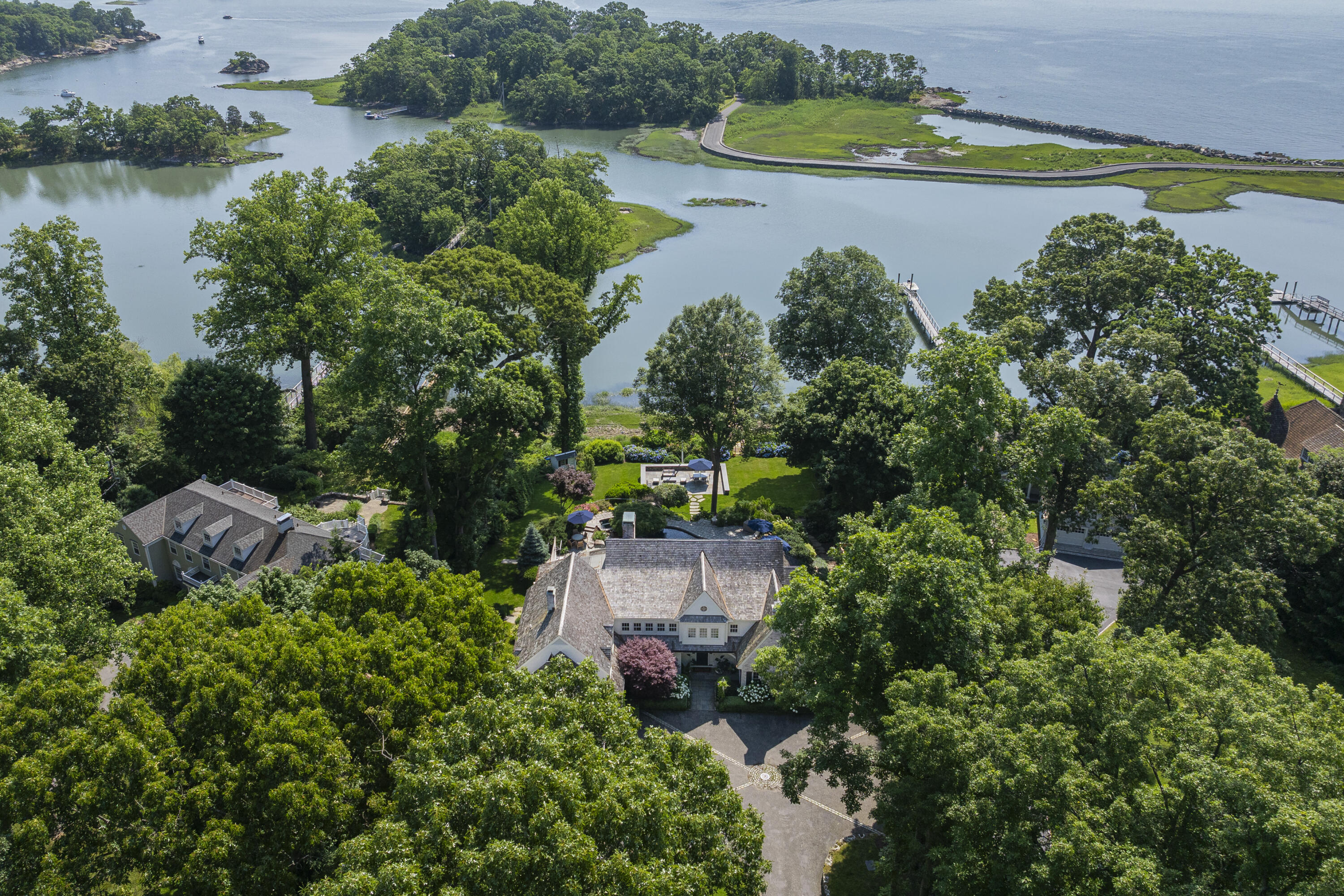 123 Long Neck Point Road Darien, CT 06820 - Photo 37 of 40 an aerial view of a house with a yard and lake view