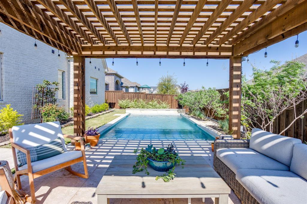 14000 Rozana Street Fort Worth, TX 76008 - Photo 36 of 38 a view of a patio with couches table and chairs potted plants