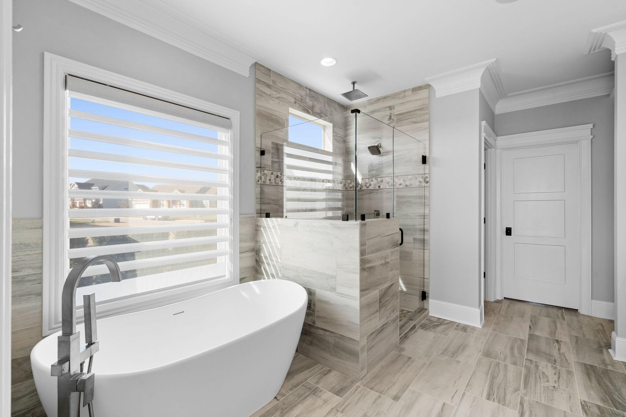 4190 Split Rail Way Whiteside, TN 37396 - Photo 13 of 25 a bathroom with a bathtub and a shower