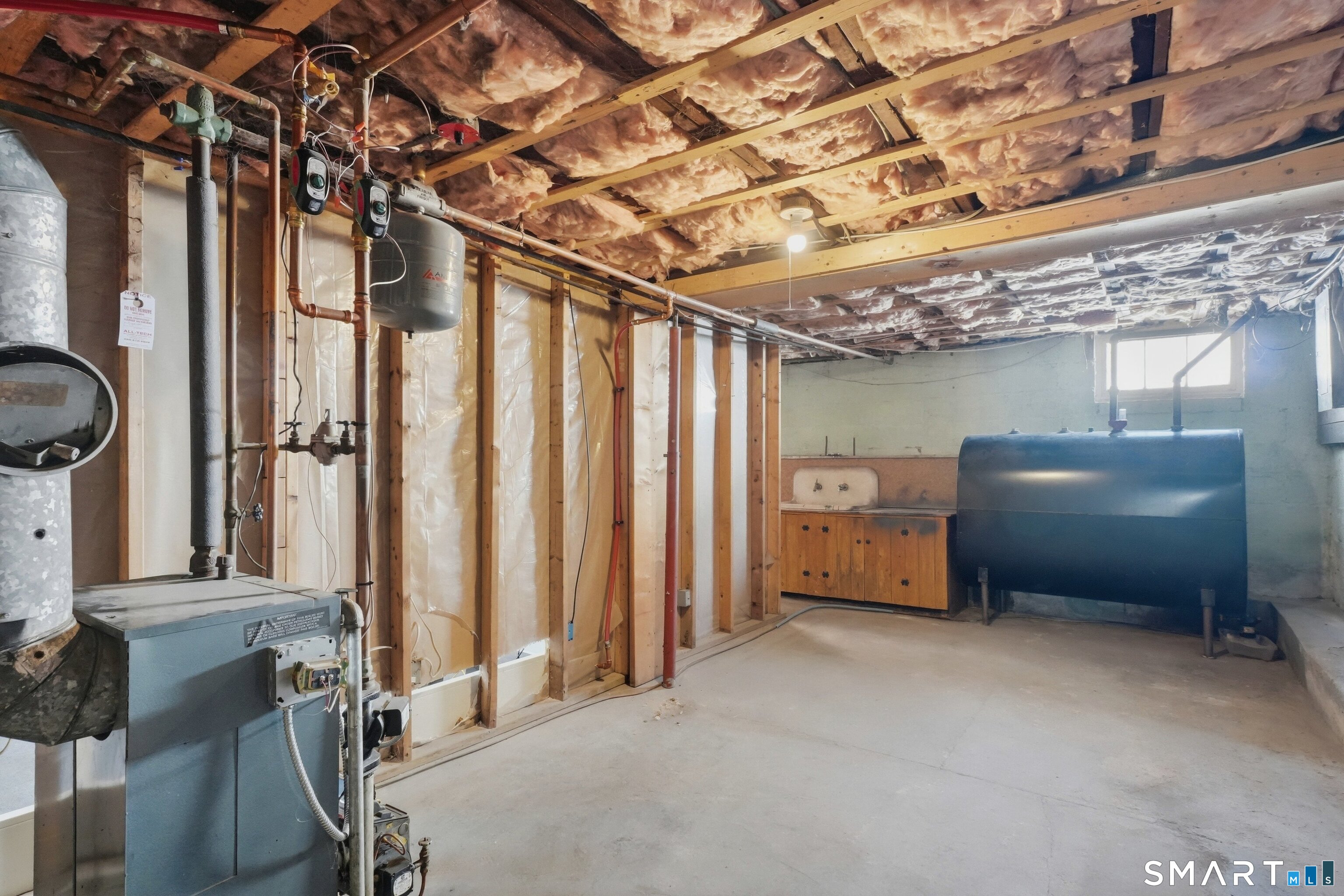74 Riverside Drive Thompson, CT 06277 - Photo 11 of 25 a view of a room with lots of furniture and windows