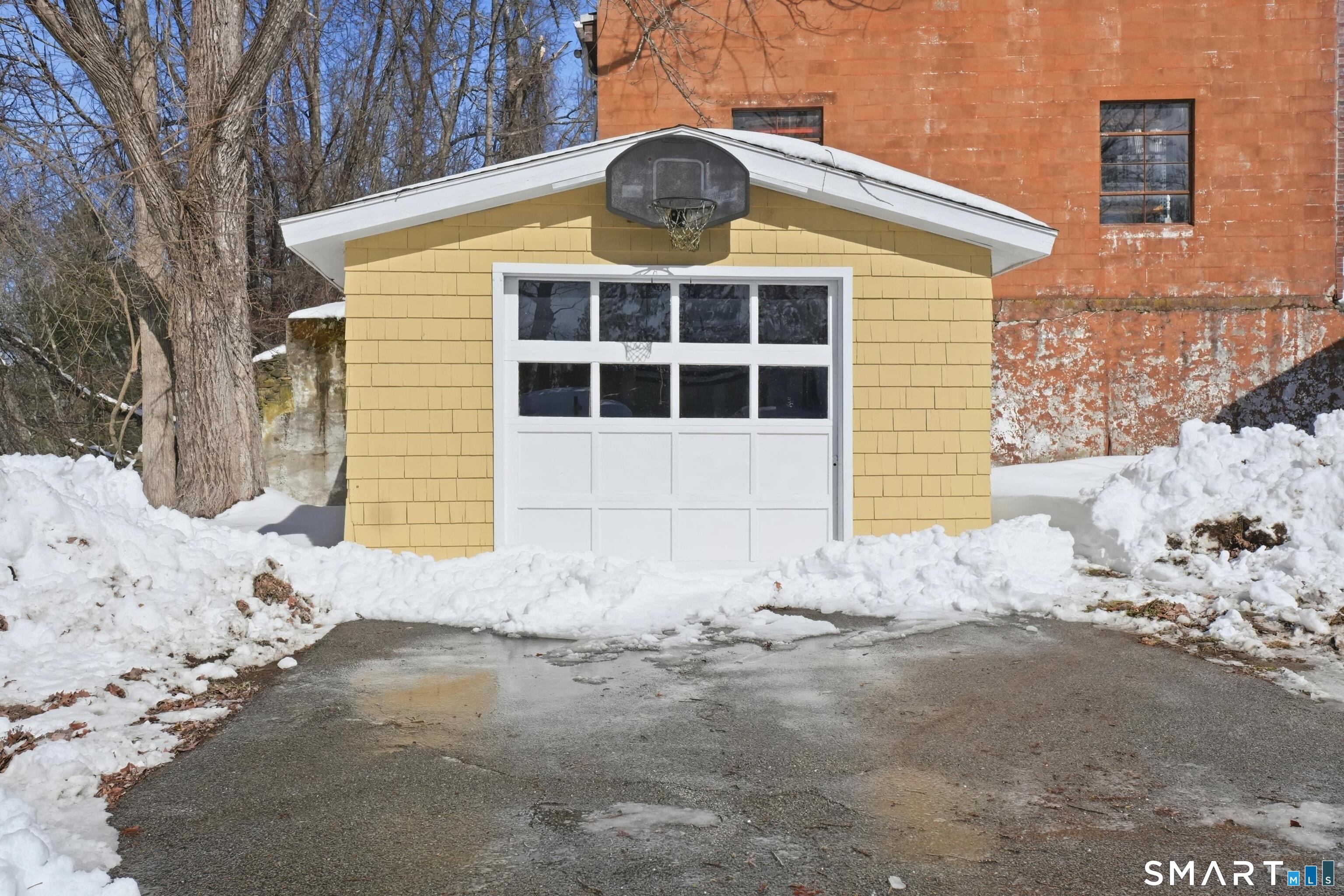 74 Riverside Drive Thompson, CT 06277 - Photo 13 of 25 a front view of a house with a yard