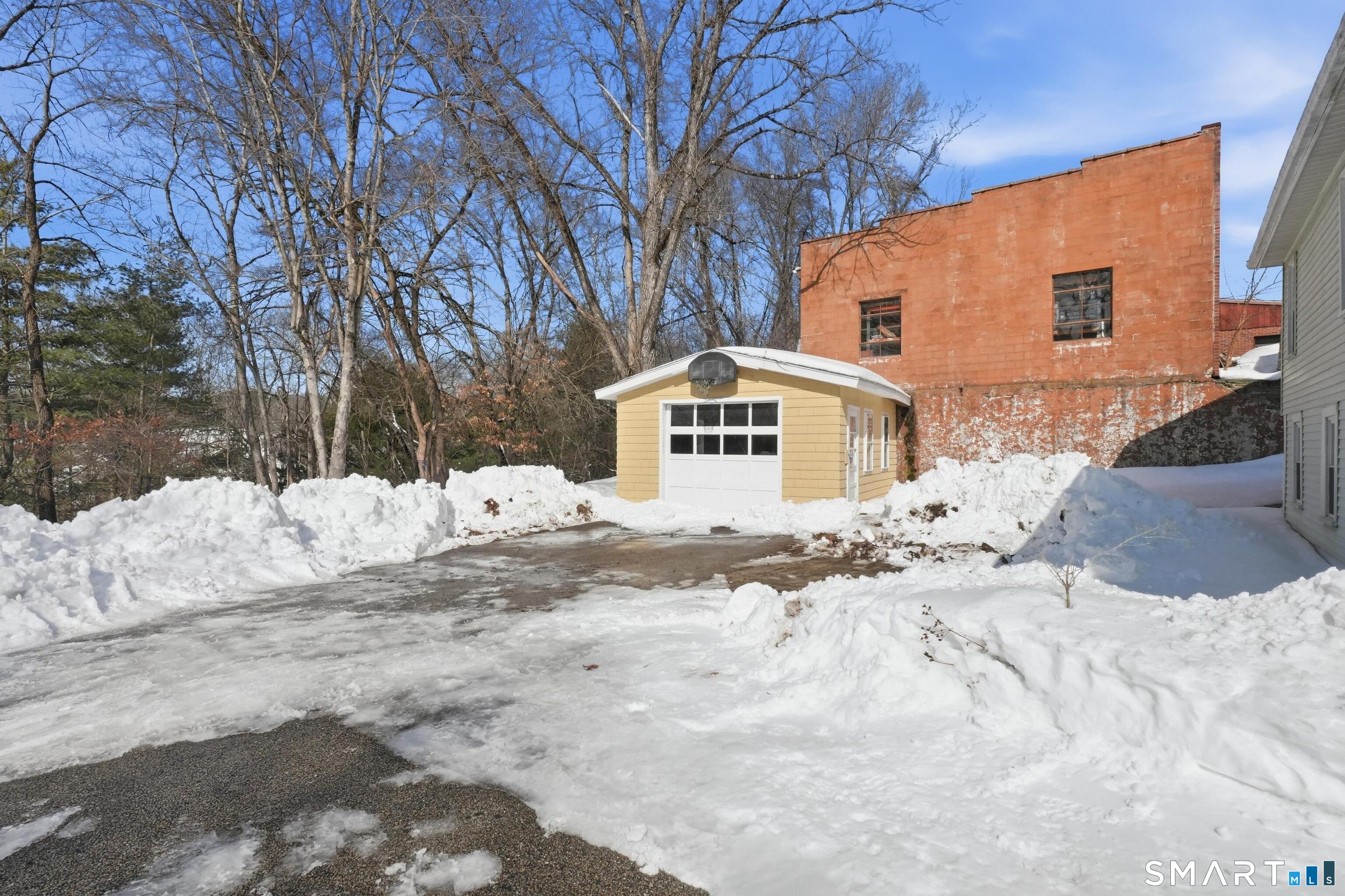 74 Riverside Drive Thompson, CT 06277 - Photo 15 of 25 a view of back yard of the house