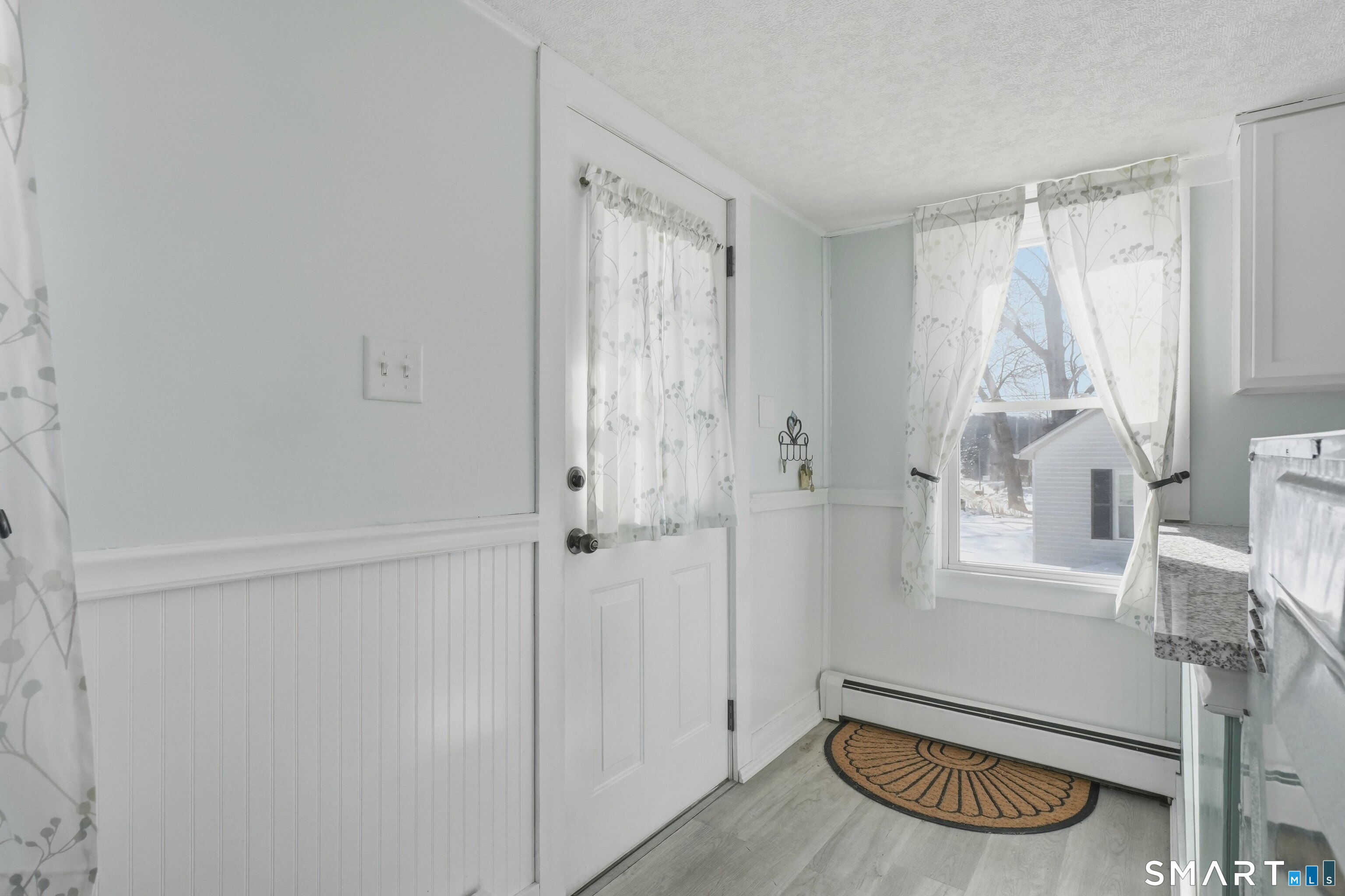74 Riverside Drive Thompson, CT 06277 - Photo 20 of 25 a bathroom with a window and a shower